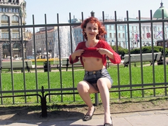 My hot redhead exwife posing naked for my camera on the streets exposing her small tits and shaved pussy. Image 2
