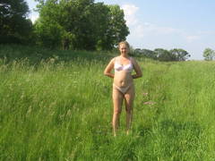 See my wife's naked pics posing in the open air on the meadow and sitting on my car. Image 9