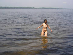 I took pictures of my hot exwife while we were on the lake. Image 6