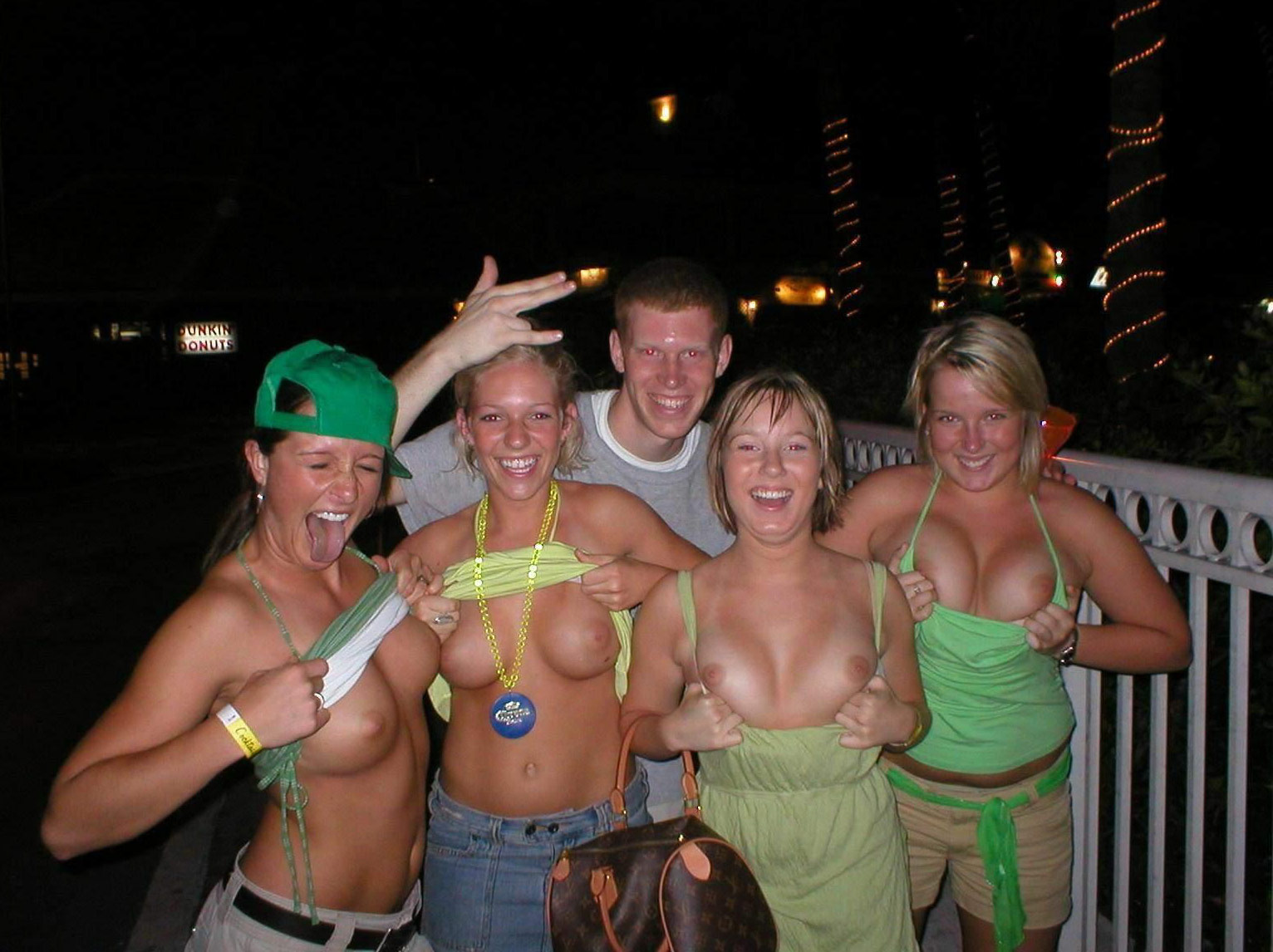 Big groups of girls flashing with their tits together - Night Flashers.